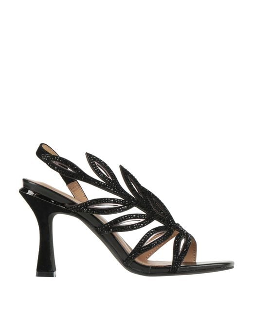 Alma En Pena. Black Sandals