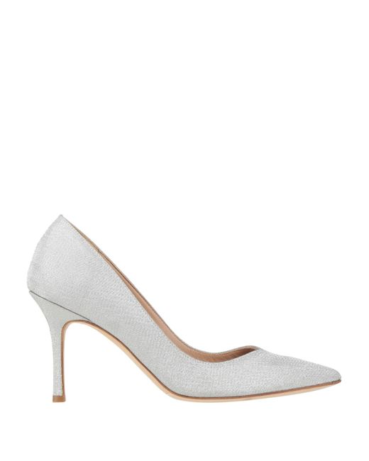 The Seller White Pumps