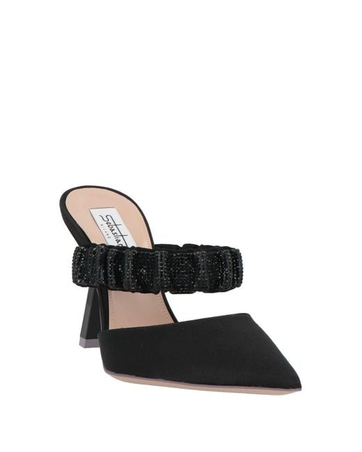 Mules & Zuecos Sebastian Milano de color Black