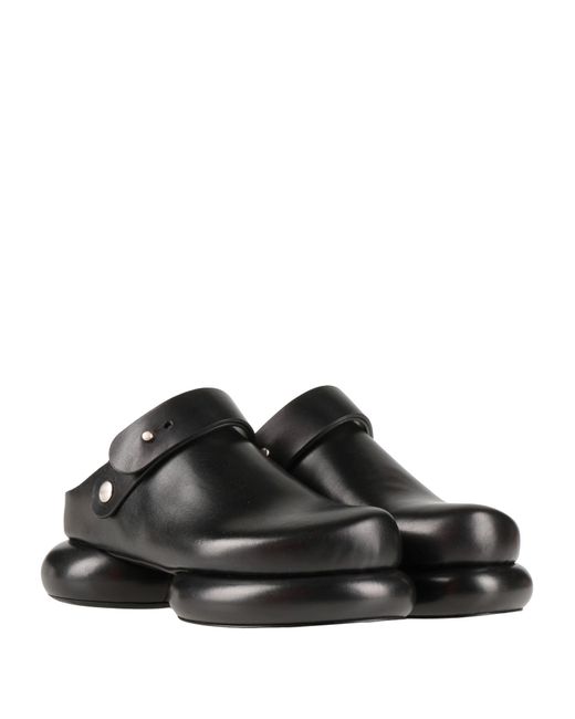 Mules & Zoccoli di Jil Sander in Black