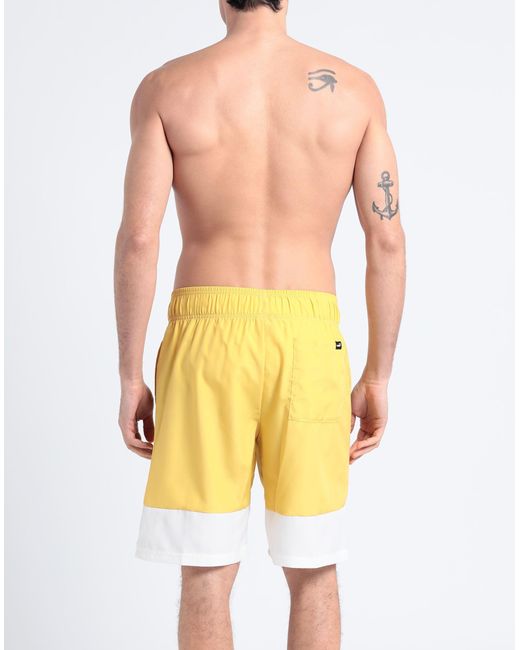 PUMA Yellow Swim Trunks for men