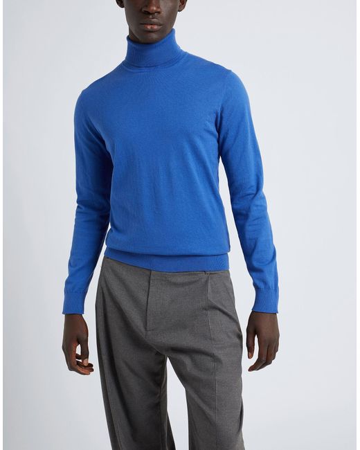bright blue turtleneck