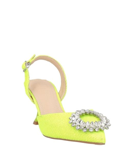 Twenty Four Haitch Yellow Pumps