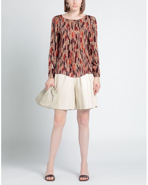 Top di Caractere in Pink