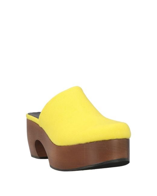 Mules & Sabots Grifoni en coloris Yellow
