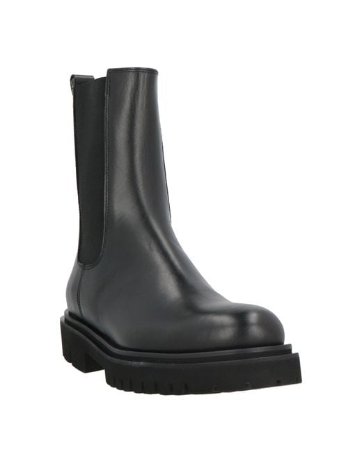 Anna F. Black Ankle Boots