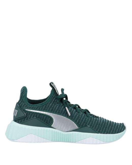 puma defy trainers green