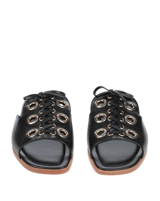 Tod's Black Sandals
