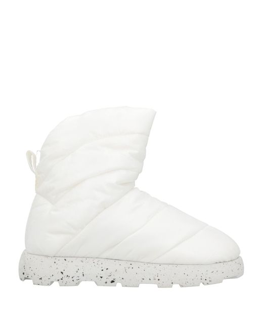 PIUMESTUDIO White Ankle Boots