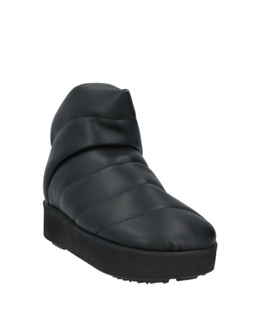 PIUMESTUDIO Black Ankle Boots