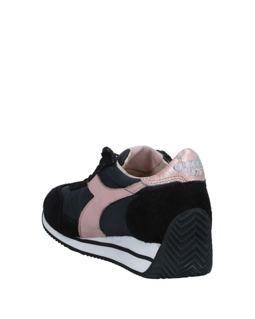 black diadora trainers