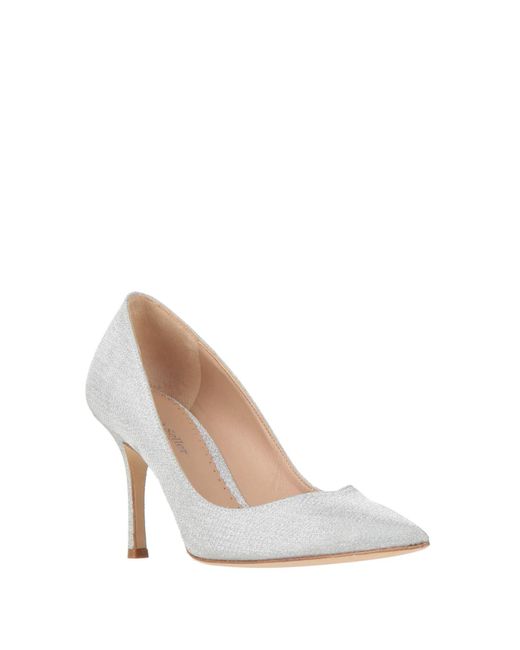 The Seller White Pumps