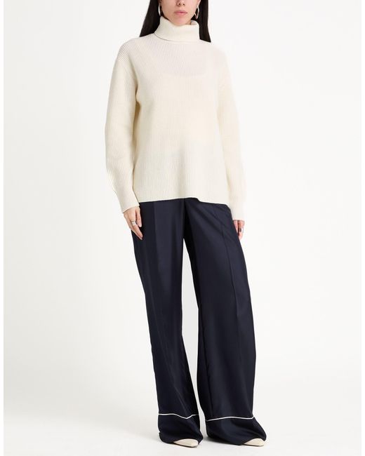 Rue de Tokyo White Turtlenecks
