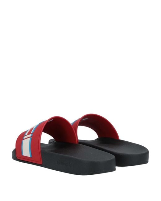 Red white and store blue gucci slides