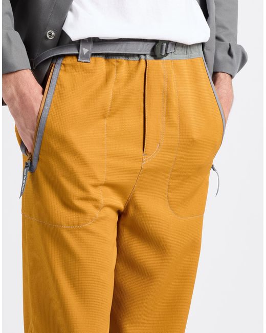 And Wander Orange Pants Polyester, Nylon for men