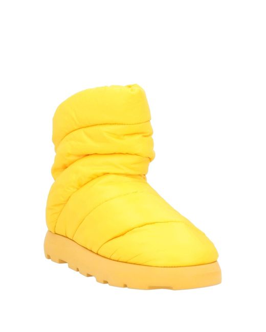 PIUMESTUDIO Yellow Ankle Boots