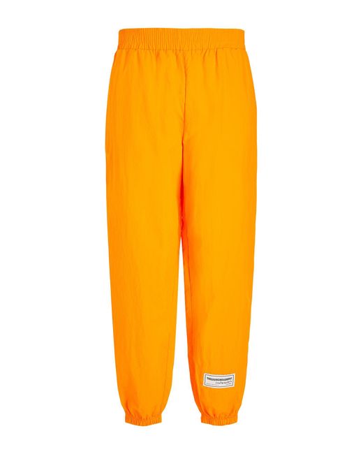 THE GIVING MOVEMENT x YOOX Orange Pants Recycled Nylon