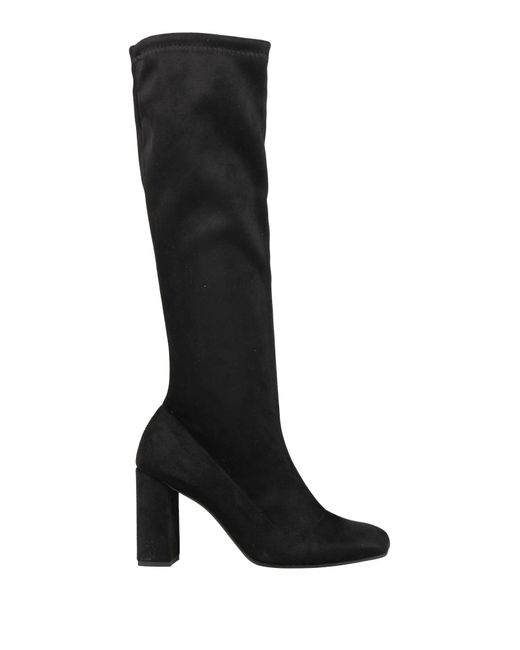 Nila & Nila Black Boot Textile Fibers