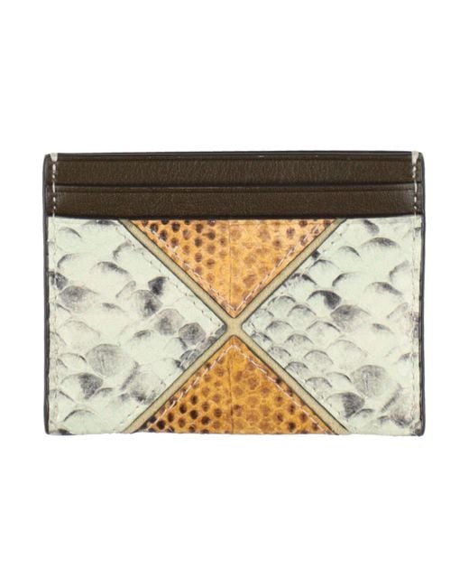 Tarjetero Tory Burch de color Metallic