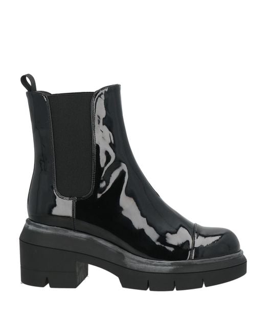 Bottines Stuart Weitzman en coloris Black