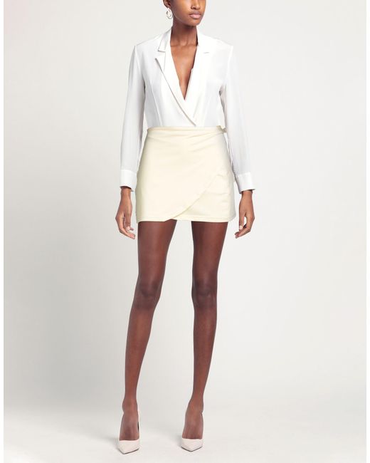 OperaSPORT Natural Mini Skirts