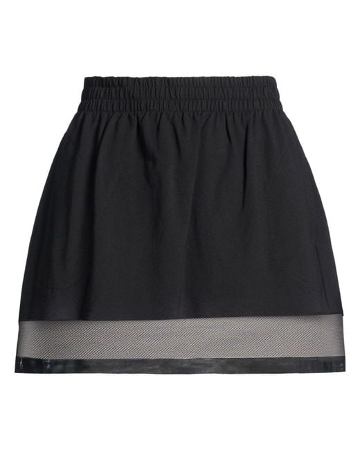 Norma Kamali Black Mini Skirts