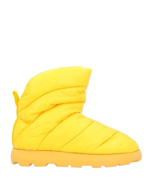 PIUMESTUDIO Yellow Ankle Boots