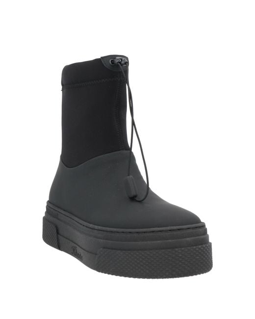 Khaite Black Ankle Boots