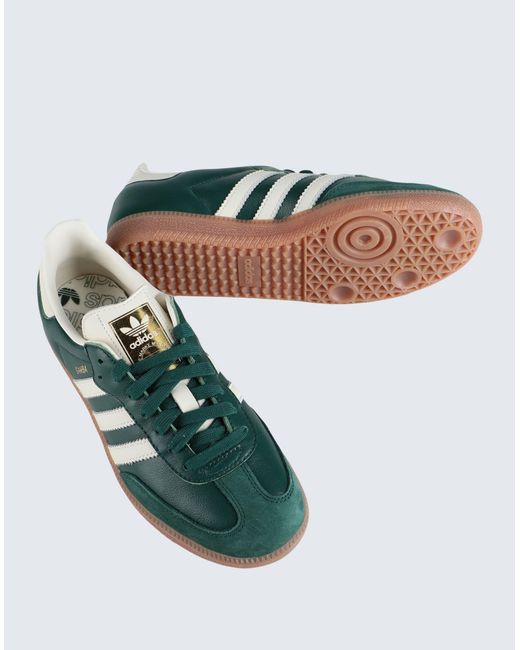 Sneakers di Adidas Originals in Green