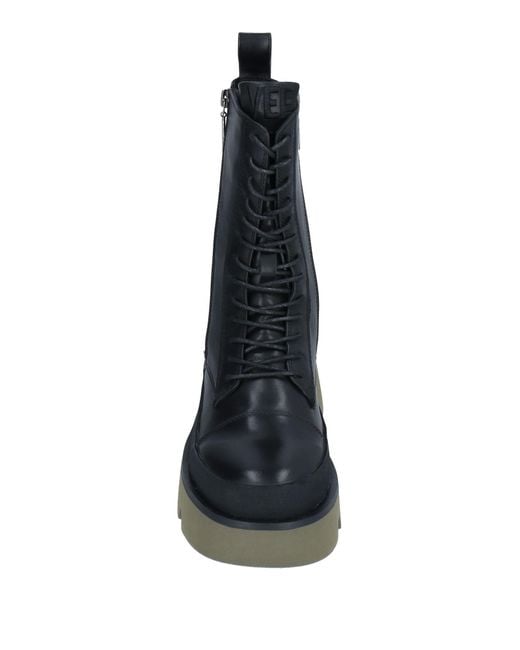Emanuélle Vee Black Ankle Boots