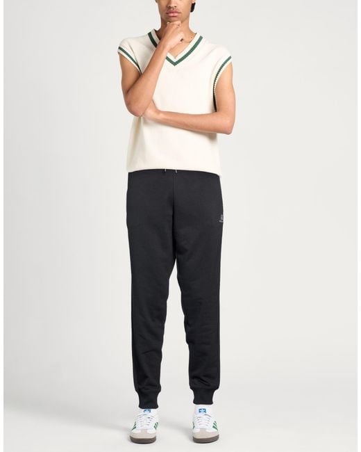 New Balance Blue Pants Cotton, Polyester, Elastane for men
