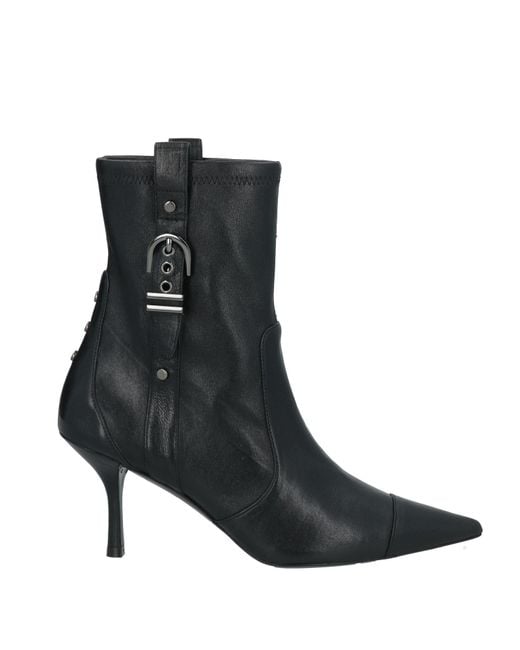 Bottines Stuart Weitzman en coloris Black
