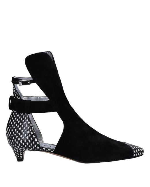 Botines De Caña Alta Givenchy de color Black