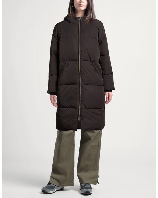 Embassy of Bricks and Logs Black Puffer