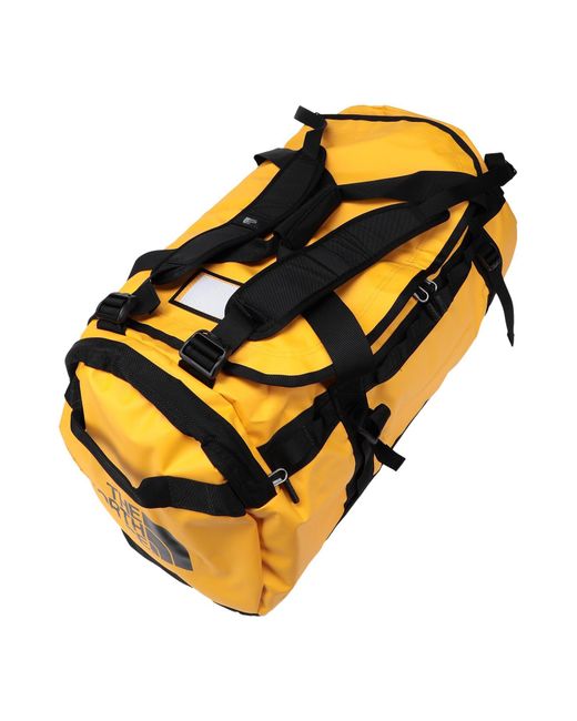 The North Face Yellow Duffel Bags