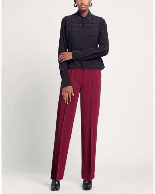 Her. Red Trouser