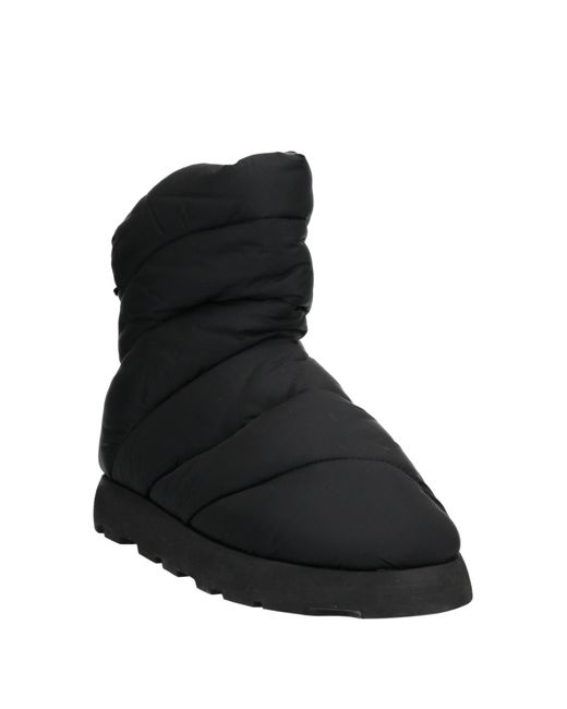 PIUMESTUDIO Black Ankle Boots