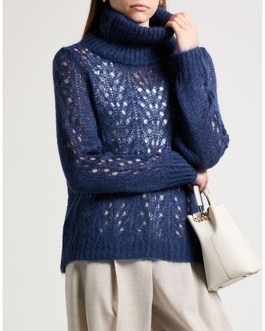 Siste's Blue Turtleneck
