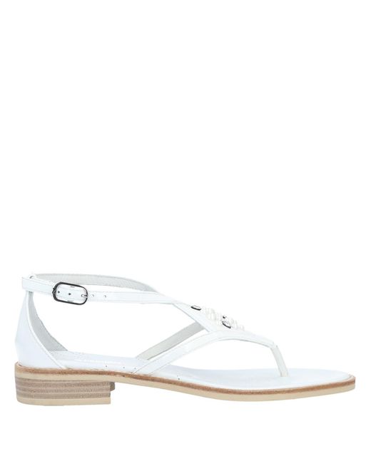 sandalias y chanclas de Sandalias planas Sandalias Nero Giardini de Cuero de color Blanco Mujer Zapatos de Zapatos planos 