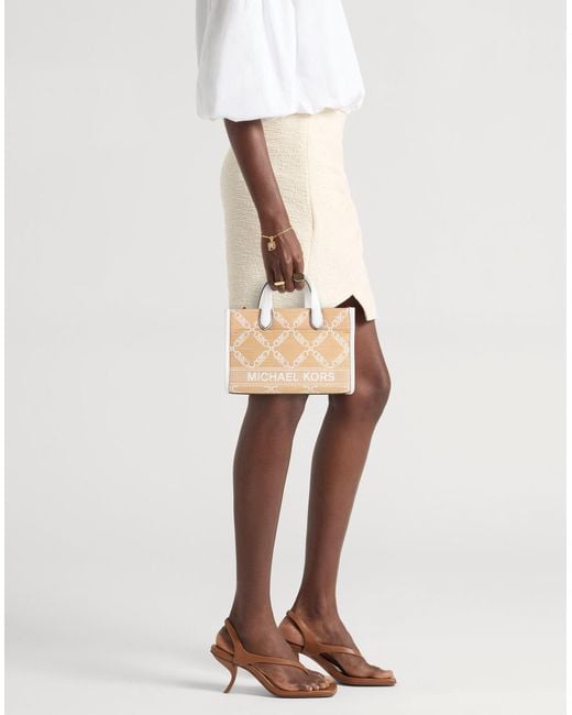 MICHAEL Michael Kors Natural Handbags