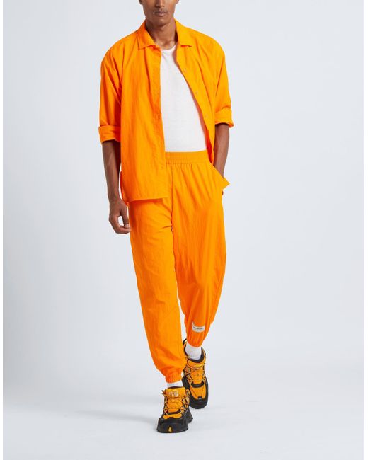 THE GIVING MOVEMENT x YOOX Orange Pants Recycled Nylon