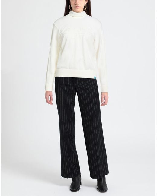 Uyn White Turtlenecks