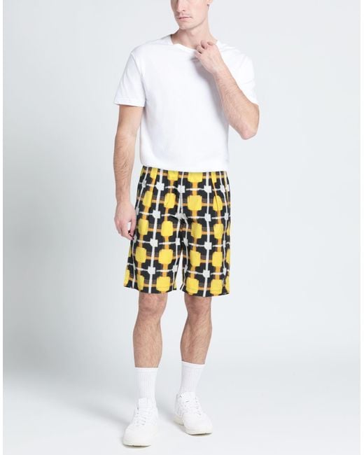 Marcelo Burlon Yellow Shorts & Bermuda Shorts for men