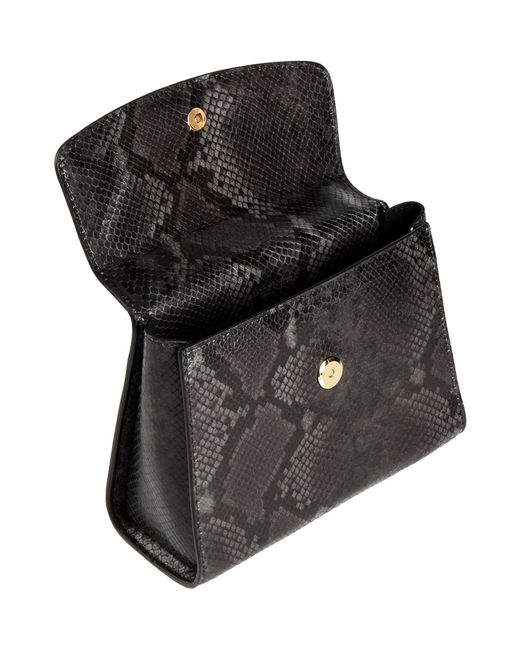 DORIS NÉRÉE Black Handbags