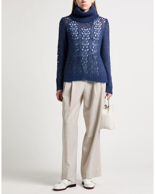 Siste's Blue Turtleneck