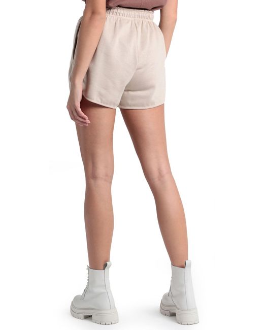 white and olive green nike shirt