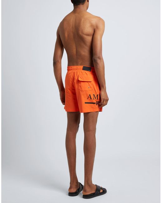 Amiri Orange Swim Trunks for men
