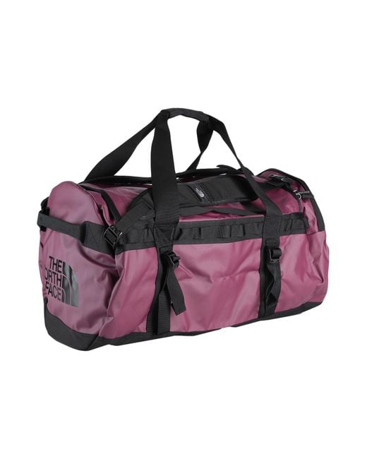 The North Face Duffel Bags in Purple Lyst