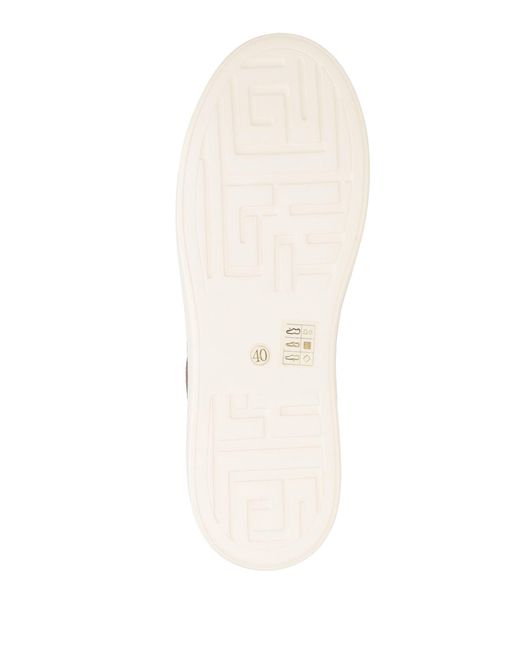 Emanuélle Vee Brown Trainers