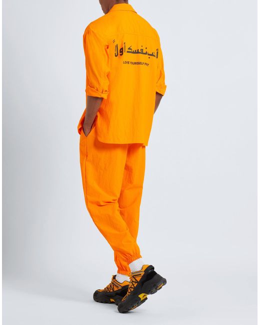 THE GIVING MOVEMENT x YOOX Orange Pants Recycled Nylon